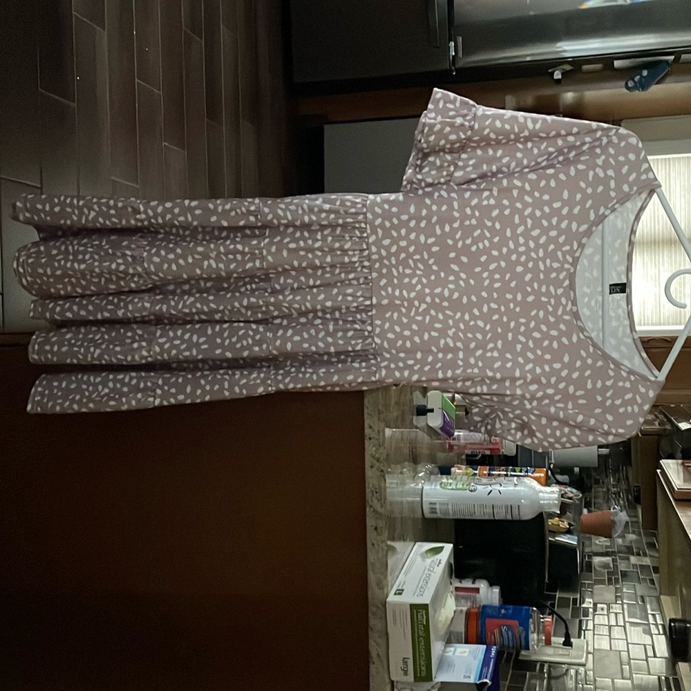 Worn once to a bridal shower. Very comfortable and flowy.